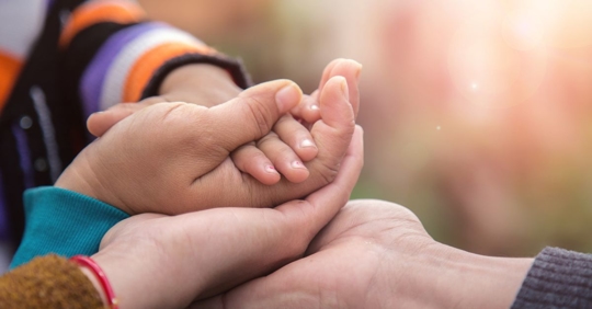 Family holding hands